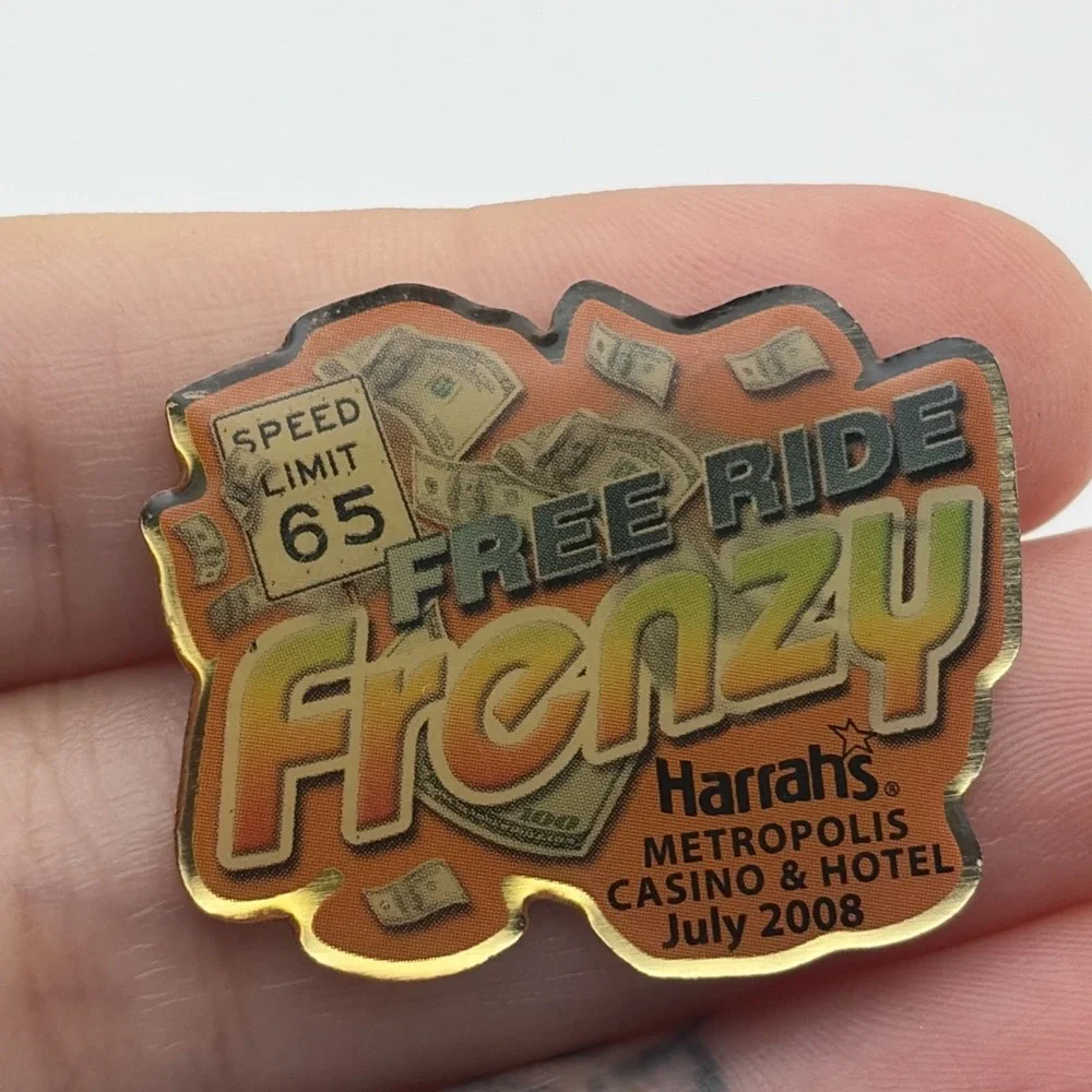 2008 Harrah's Metropolis Casino & Hotel Free Ride Frenzy Lapel Hat Pin